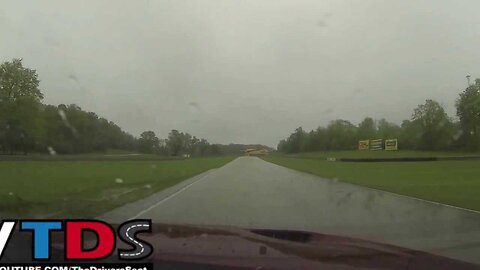 Tommy Kendall shows us how to drive the rain line at Road America in a 2013 Jeep Grand Cherokee SRT