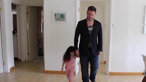 3-year-old girl dresses her dad for a week