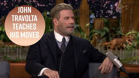 John Travolta redeems himself after dad dancing