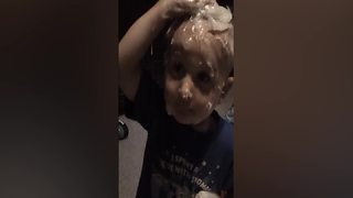 Tot Kid Gets Himself Covered With Vaseline