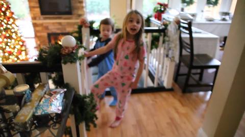 "Little Girl Excited To Open Christmas Present Doesn't Want To Wait For Dad Who's Pooping"