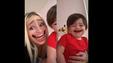 Funny Mom And Cute Child With Funny Filter having Fun