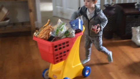 Cute footage of toddler helping mom with groceries