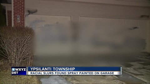 Ypsilanti Township family wakes up to racial slurs, derogatory language spray painted on garage