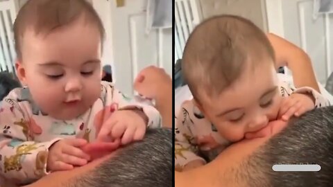 Cute Baby Likes to Eating Daddy's Ear