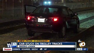Car becomes stuck on trolley tracks in Barrio Logan