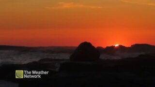 Warm glowing sunset over Peggy's Cove