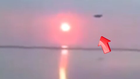 UFO passes near the Red Sun [Space]