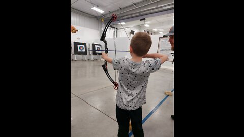 5 year old trying archery the first time