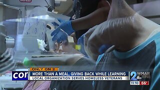 Students from Blind Services and Industries of Maryland prepare dinner for veterans