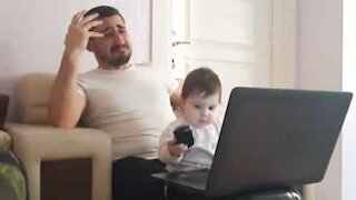 Baby makes dad's work from home impossible!
