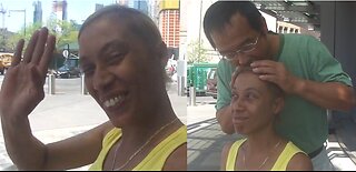 Luodong Massages Skinny Dark Skinned Woman On Sidewalk