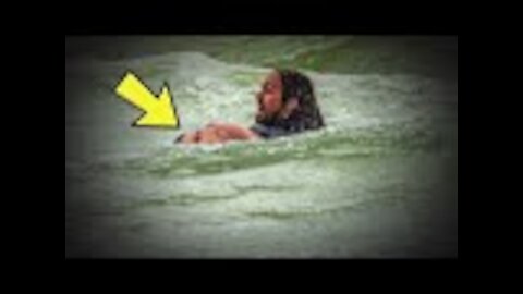 Man In Water Feels Something Hit His Leg, Then Sees Tiny Foot Pop Up