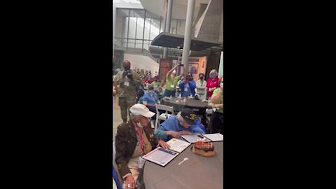 Over 100 veterans sing Happy Birthday to World War II Vets Bette and Rosalyn