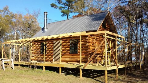 Off Grid Log Cabin Build #25F Porch Roof Beam