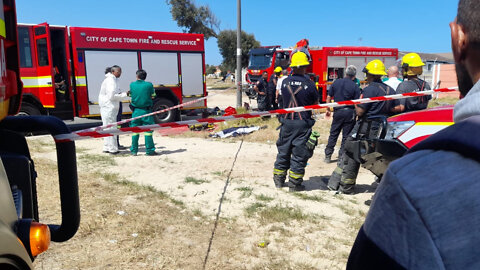 Watch: Rescue workers have retrieved the body of a second person who became trapped underground in Mitchells Plain