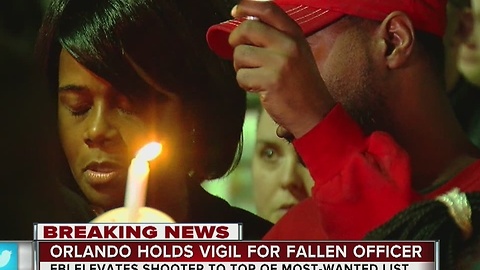 Orlando holds vigil for fallen officer