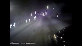 Milwaukee Police Department rescues 2 people from car fire