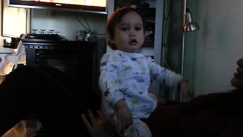 Crying baby decides to "Let It Go" and dance to Disney's 'Frozen'
