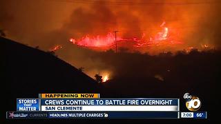 Crews continue to battle fire overnight