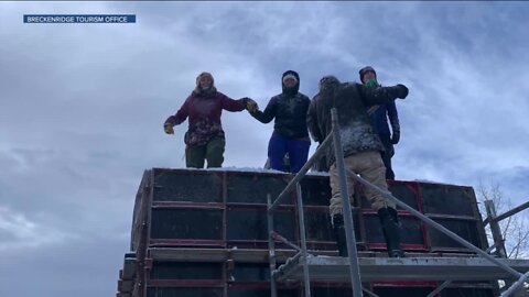 Stomping to create blocks for Breckenridge Snow Sculpture Championships