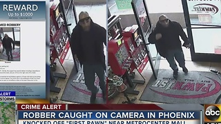 Pawn shop robber caught on camera near Metro Center Mall
