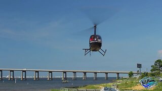 Robinson R44 arriving at Navarre Family Watersports