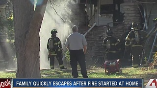 Family escapes after fire started at home