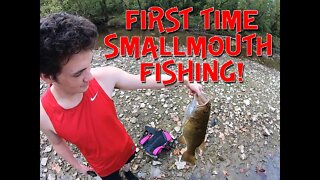 Putting my nephew on his FIRST SMALLMOUTH!