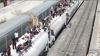 Drone footage captures the latest train heading towards the US border, full of fighting age men