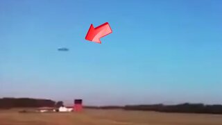 One saucer-shaped UFO leaves over the facility