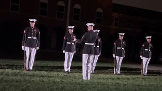 The Marine Corps Silent Drill Platoon performs a rifle check ￼