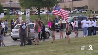 Health care workers protest vaccine mandate at local hospitals