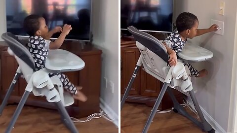 Toddler Uses High Chair To Move Across The Room