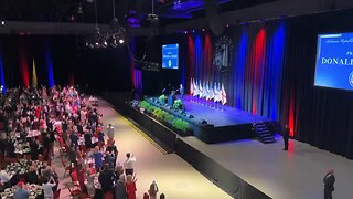 President Trump takes the stage at a packed crowd in Montgomery, Alabama.