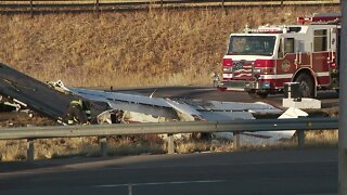 2 injured after plane crash in median on E-470