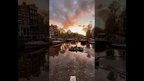 Sunset over a canal in Amsterdam, Amazing !!!! Travel Hotels Flights Vacation Trip Travel. #Shorts