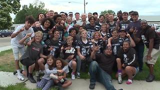 Hero football players meet couple they helped save