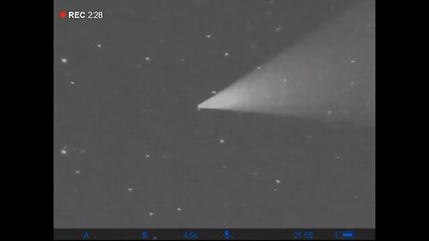 very high altitude UFO splits off as another one pops in and out