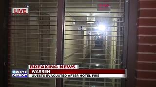 About 100 evacuated after fire at Warren hotel