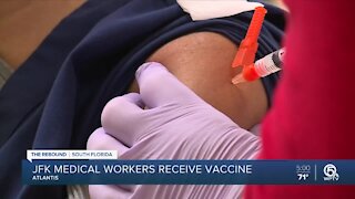 JFK Medical Center workers get emotional receiving coronavirus vaccine