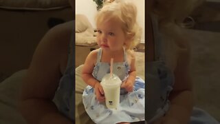 Sweet Toddler drinks a Milkshake