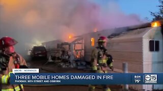Three mobile homes catch fire Saturday near 16th St. and Osborn Rd.