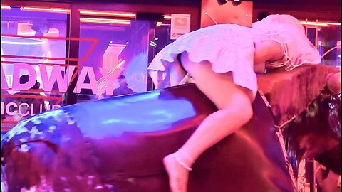 White Bride Riding on a Bull in Benidorm 4K quality