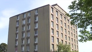Toddler hospitalized after falling through window of apartment building