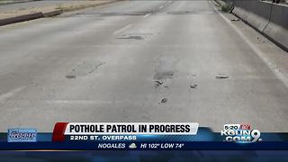 Recent rain creates additional potholes on 22nd St