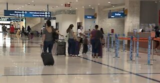 Travelers hit airports, roads for Memorial Day weekend