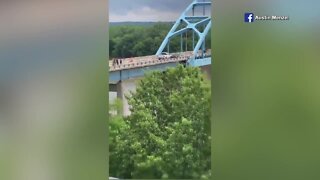 Viewer footage of active shooter situation on Centennial Bridge