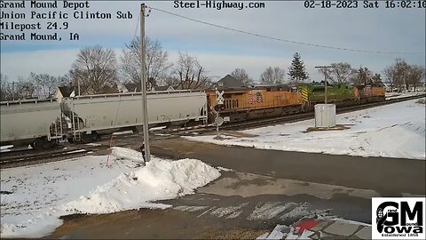 EB Manifest with NS 1072 at Belle Plaine and Grand Mound, IA on February 18, 2023