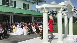 Nearly 40 couples say 'I do' during Valentine's Day wedding